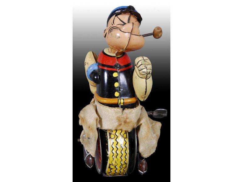 Appraisal: Linemar Tin Wind-Up Popeye on Unicycle Toy Description - ''