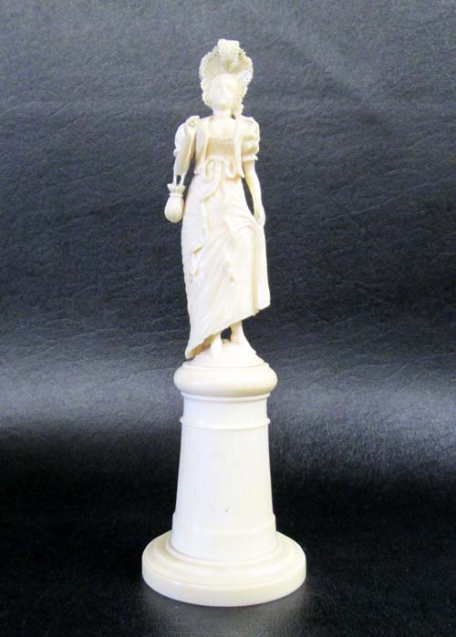 Appraisal: VICTORIAN IVORY CARVED FIGURE of woman in long period dress