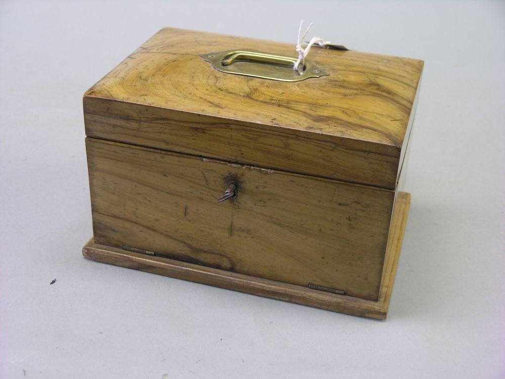 Appraisal: A th century olive wood jewellery casket hinged top enclosing