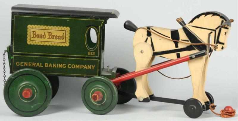 Appraisal: Rich Toys Horse-Drawn Bond Bread Wagon Toy American All wooden