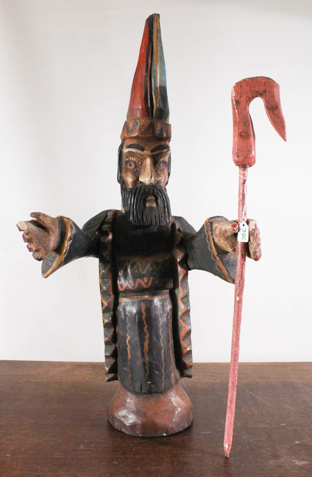 Appraisal: CARVED WOOD SANTO with staff and colorful robe and hat