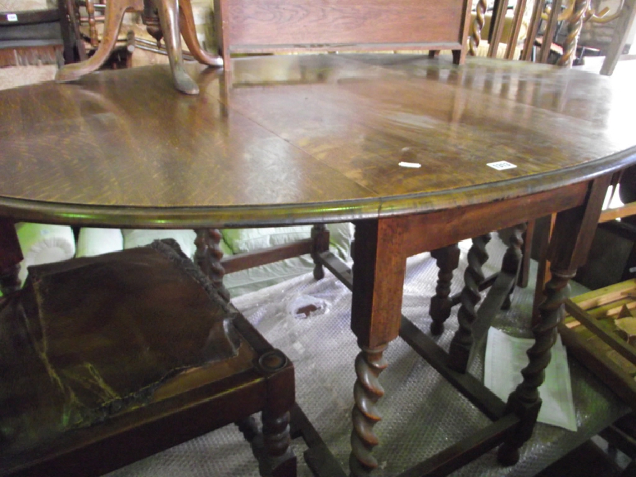 Appraisal: A s oak gateleg dining table table with barley twist