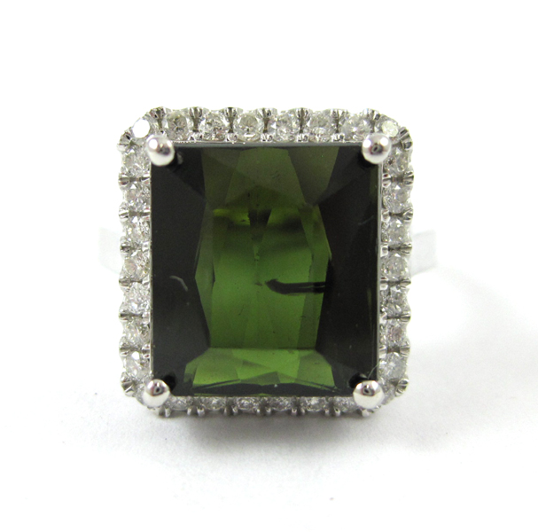 Appraisal: GREEN TOURMALINE AND DIAMOND RING The k white gold ring