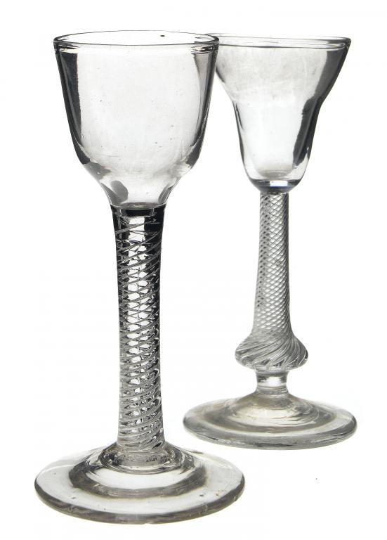 Appraisal: TWO GEORGE III WINE GLASSES the ogee or double ogee