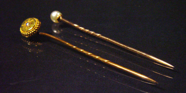 Appraisal: ct gold diamond stickpin and a pearl stickpin