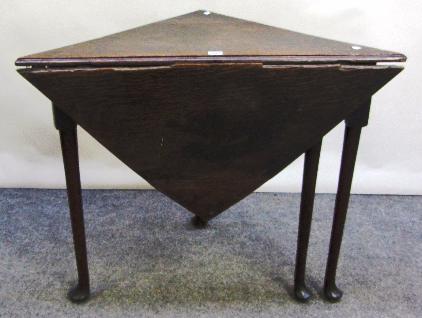 Appraisal: An th century oak drop flap handkerchief table on four