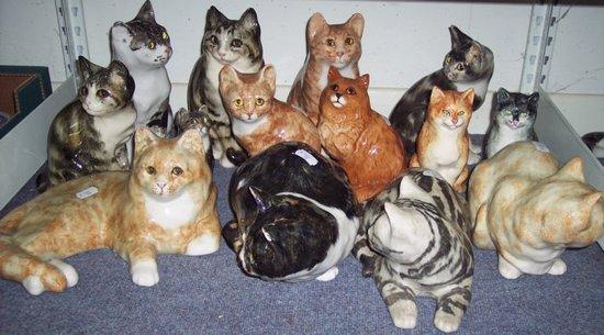 Appraisal: A large quantity of pottery cats by Jenny Winstanley and