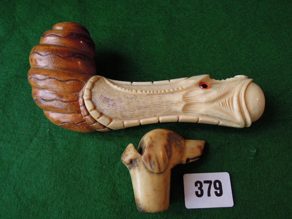 Appraisal: A walking stick with bone knop carved in the form