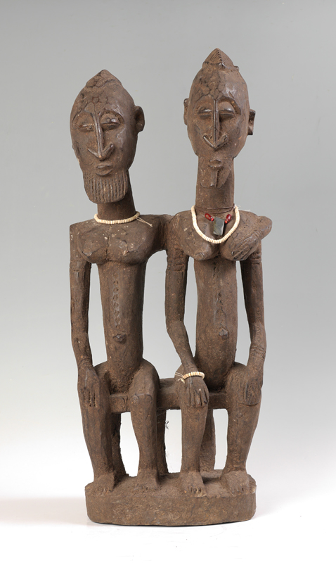 Appraisal: CARVED AFRICAN DOGON TRIBAL COUPLE FIGURE Circa late th to