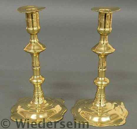 Appraisal: Pair of Queen Anne brass candlesticks c with petal bases