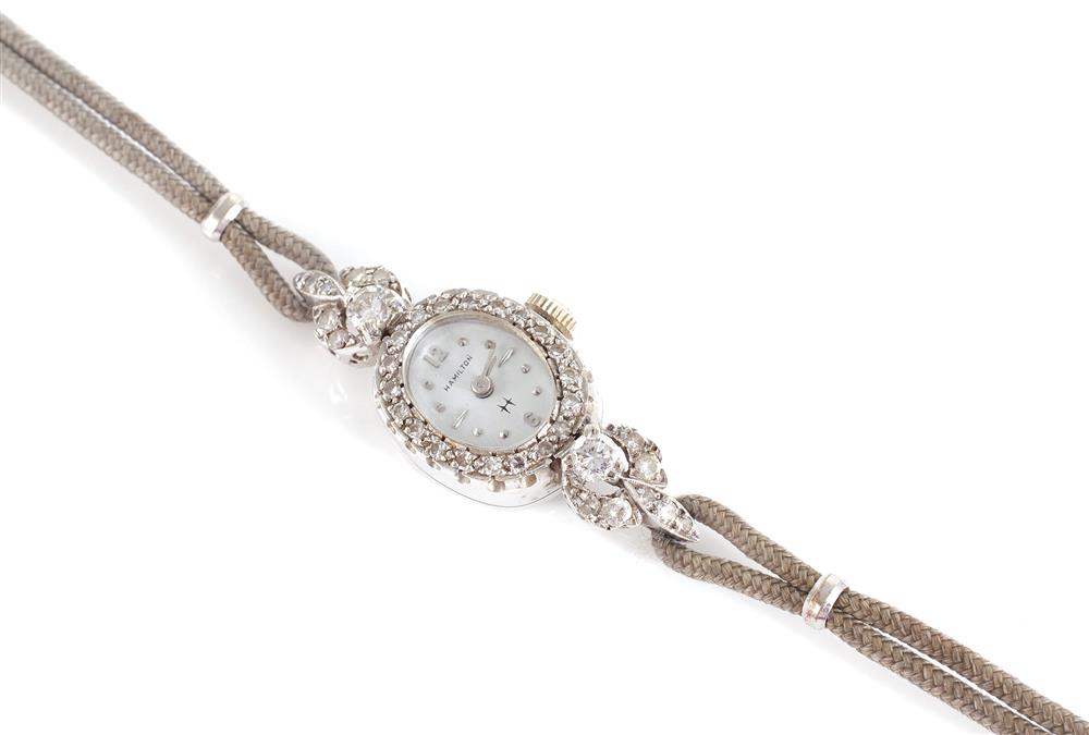 Appraisal: Hamilton gold and diamond lady's wristwatch -jewel movement in diamond-encrusted