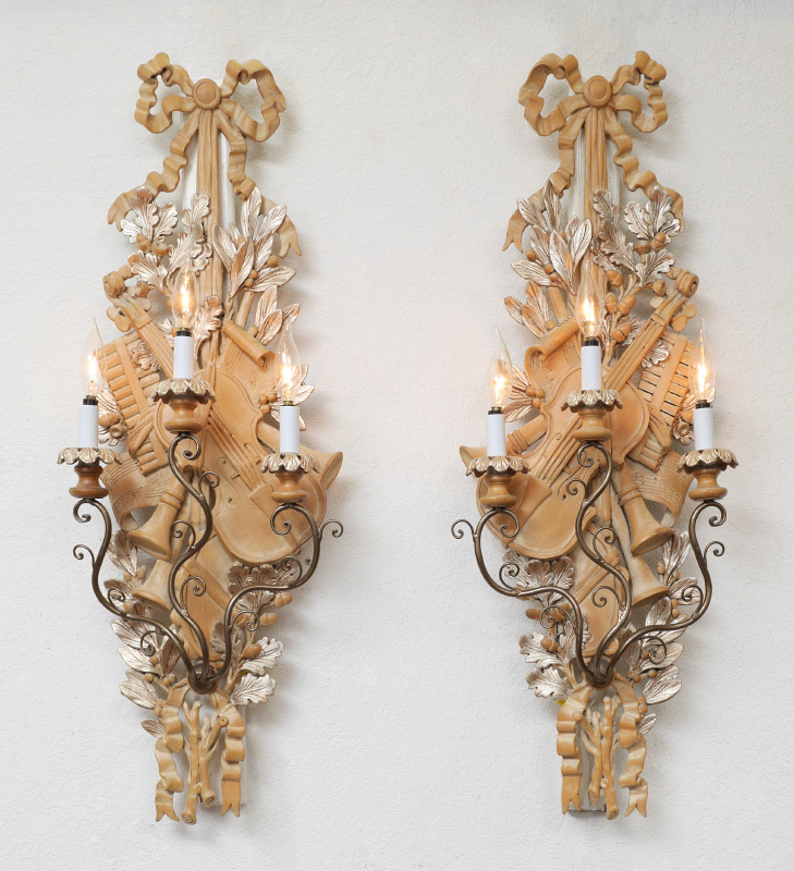 Appraisal: PAIR OF MUSICAL INSTRUMENT THEME WALL SCONCES Composite sconces with