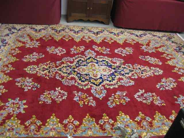 Appraisal: Tabriz Persian Handmade Room Size Rug grand central medallion red