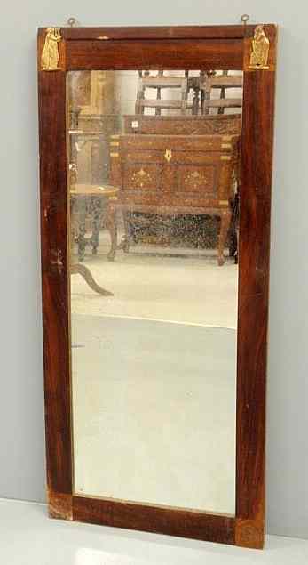 Appraisal: Continental mahogany rectangular mirror th c with relief classical figures