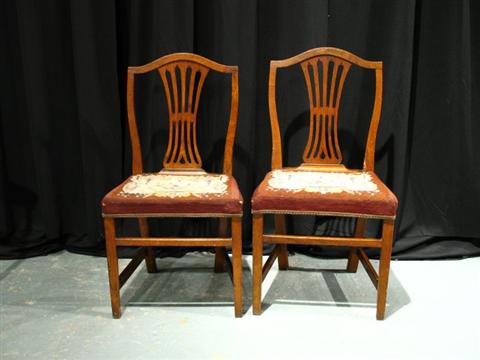 Appraisal: PAIR OF HEPPLEWHITE ELM CHAIRS Nineteenth century each with pierced