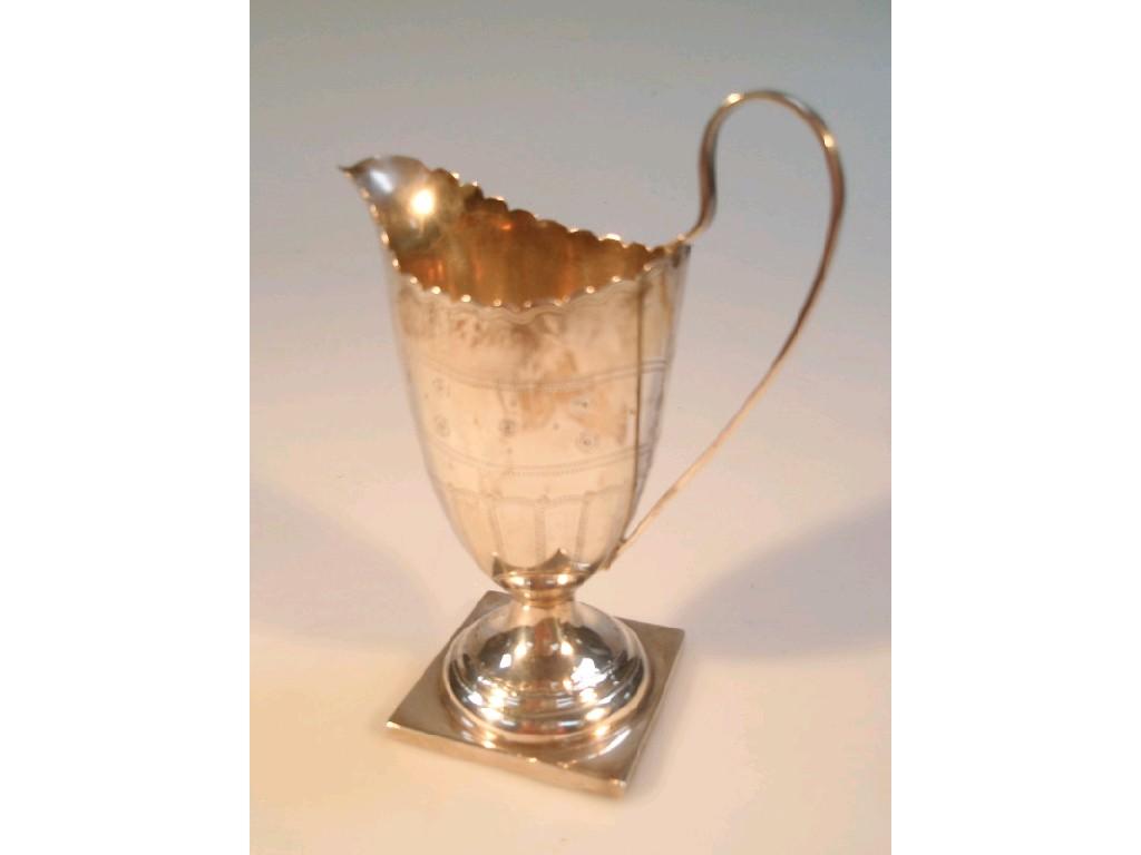 Appraisal: A Victorian silver helmet cream jug by William Neale Son