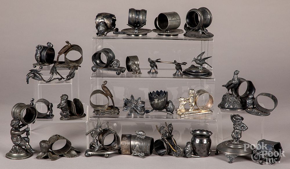 Appraisal: Collection of silver plated napkin rings Collection of silver plated