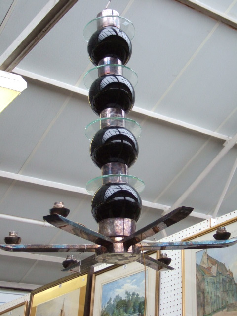 Appraisal: A glass and black painted metal chandelier by Genet Michon