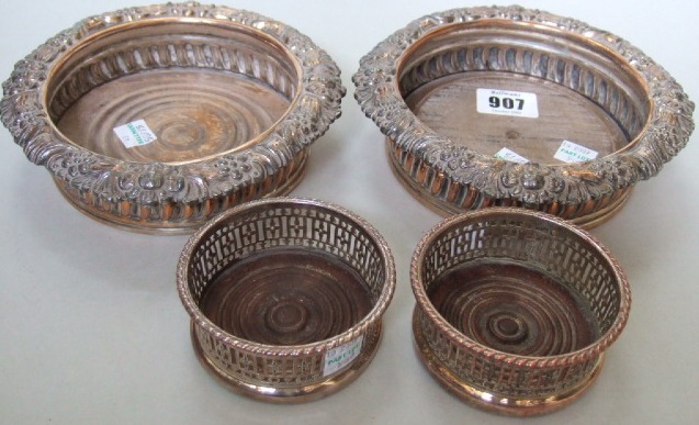 Appraisal: A pair of plated on copper bottle coasters the rims