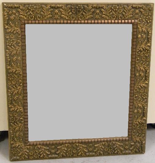 Appraisal: Bronzed foliate relief frame with mirror '' x '' minor