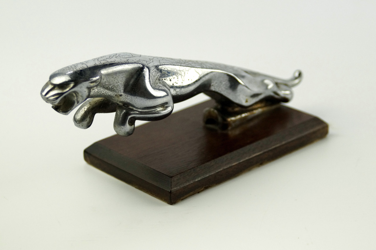 Appraisal: A mid 's Jaguar car mascot upon mahogany plinth cm