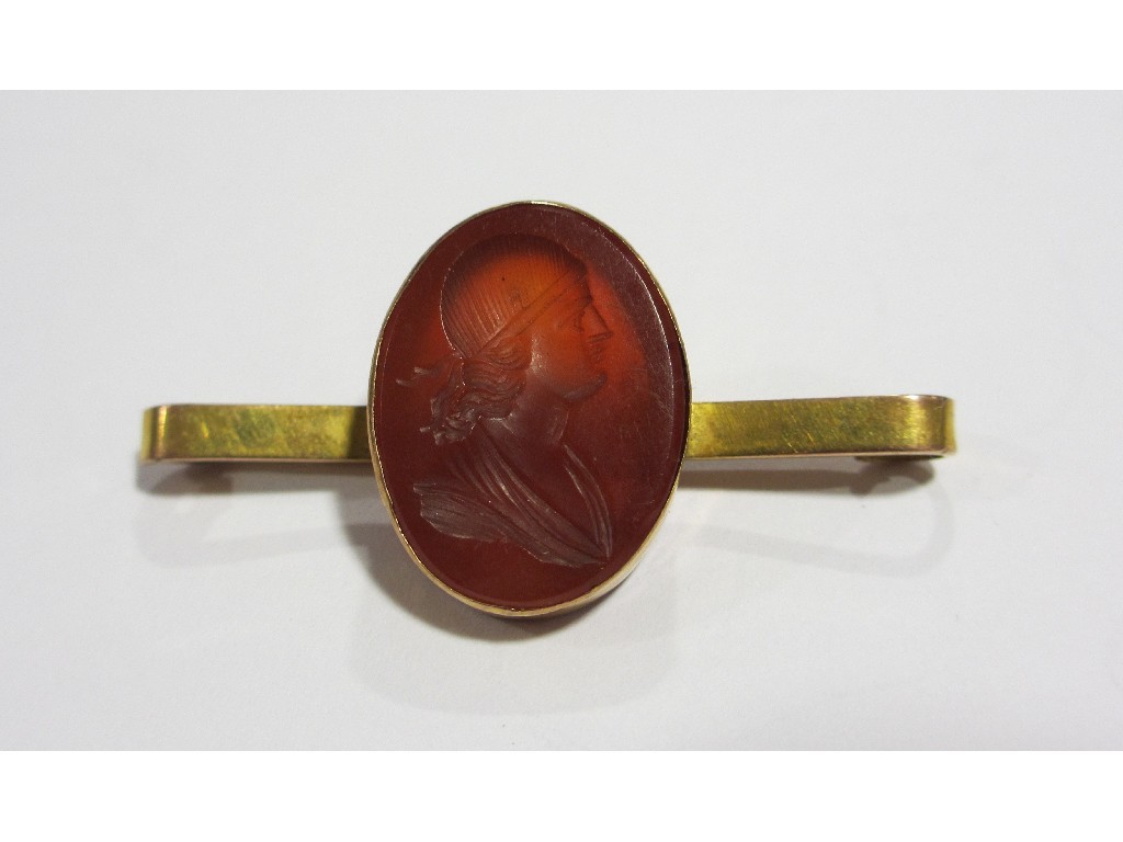 Appraisal: Nine carat gold mounted cornelian intaglio bar brooch