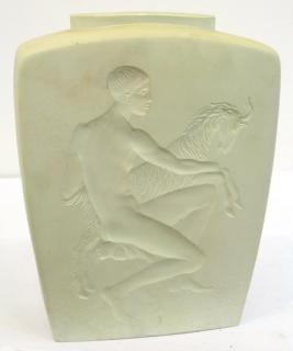 Appraisal: German Art Deco The matte-glazed body depicting a youth and