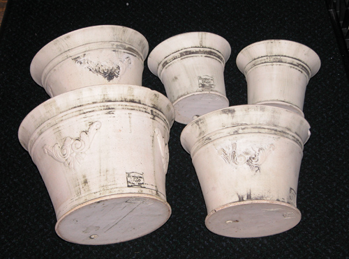 Appraisal: English Stoneware Pots and Saucers th Century Unknown Largest diameter