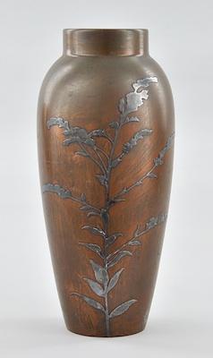 Appraisal: A Heintz Bronze Vase with Silver Overlay The simple tapering