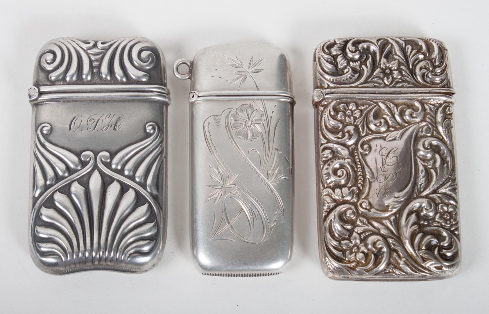 Appraisal: Three American sterling silver match safes ozt Condition Various monograms