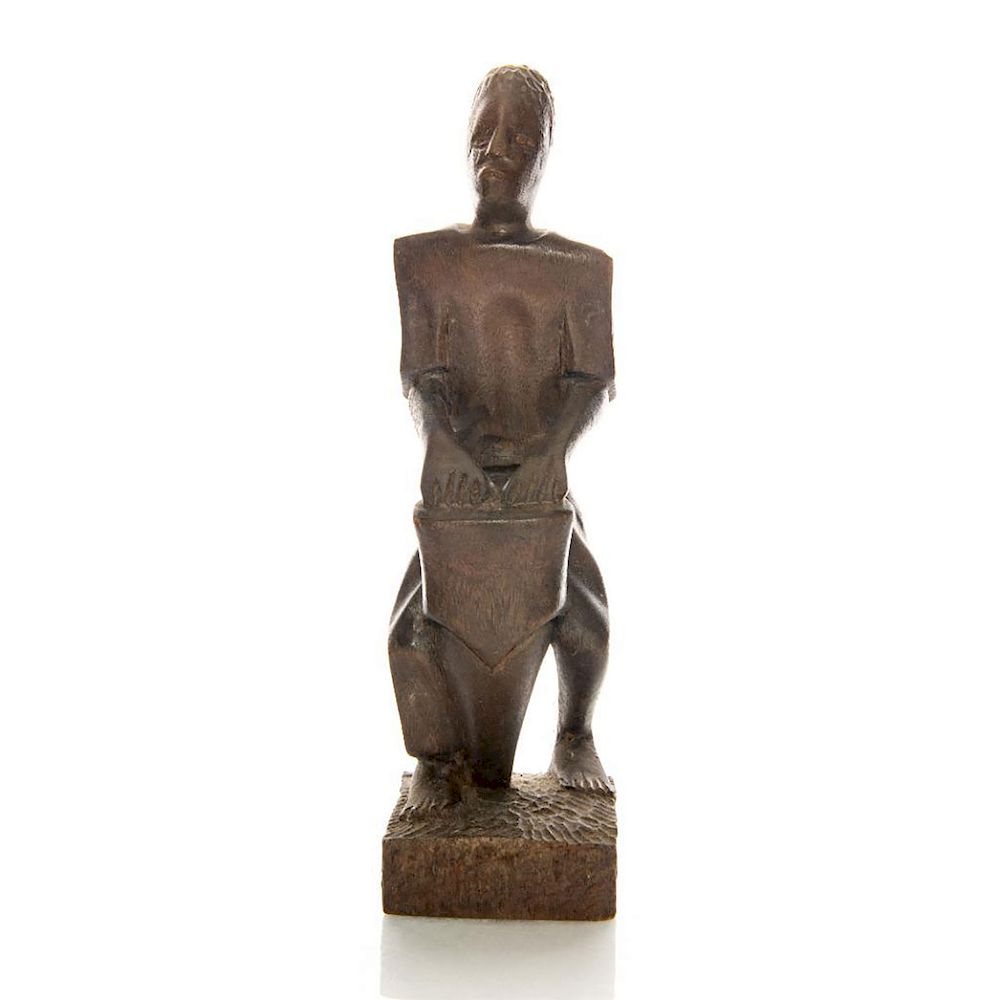 Appraisal: VINTAGE AFRICAN WOODEN FIGURINE NATIVE MUSICIAN Handcarved tribal figurine depicts