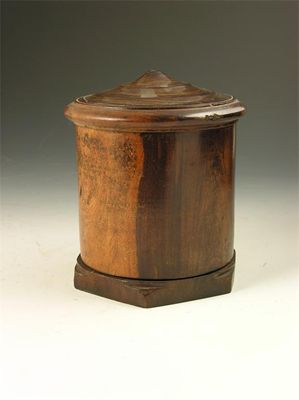 Appraisal: A th century lignum vitae cylindrical string box with an