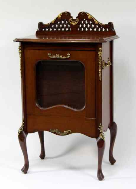 Appraisal: An early th Century record cabinet with glazed fall front