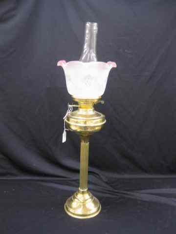 Appraisal: Brass Kerosene Lamp cranberry to clear satin shade overall ''