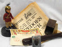 Appraisal: Various military items comprising a newspaper a truncheon doll frame