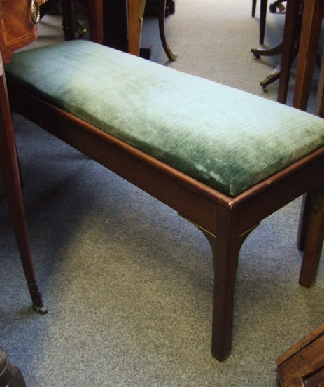 Appraisal: A mahogany rectangular duet stool