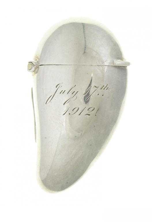 Appraisal: A VICTORIAN SILVER NUT NOVELTY VESTA CASE plain engraved with