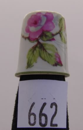 Appraisal: Limoges white enamel thimble with pink rose