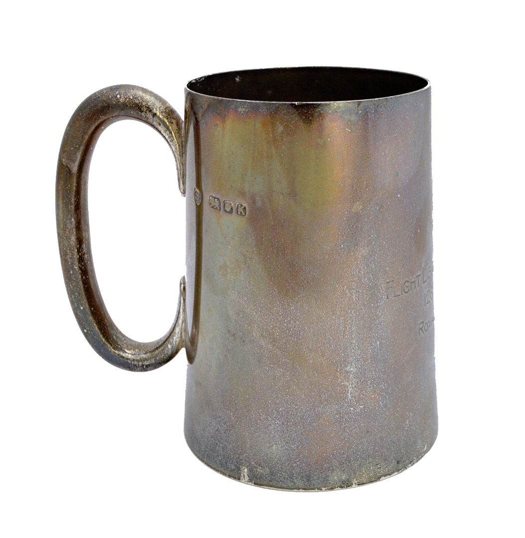 Appraisal: A silver mug of tapering cylindrical form with a 'C'