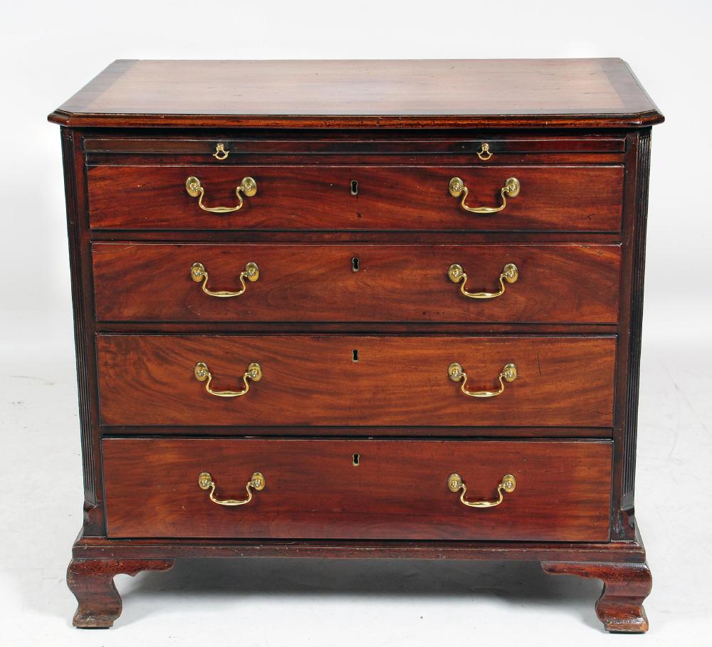 Appraisal: A GEORGE III MAHOGANY CHEST the moulded edged and banded