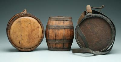 Appraisal: Three wooden canteens one circular hand wrought iron bands leather