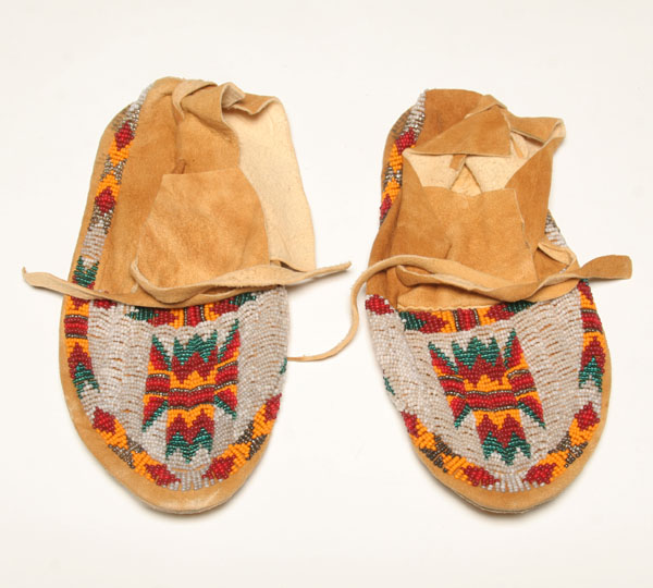 Appraisal: Native American Moccasins buckskin ankle height with beaded tribal symbols