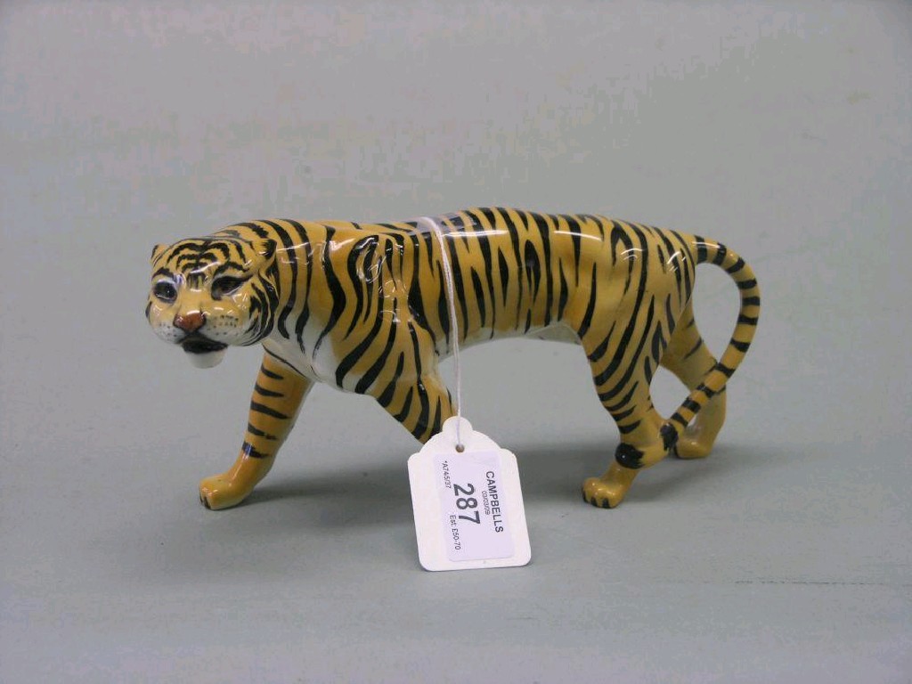 Appraisal: A Beswick Tigress shape tan with black stripes gloss