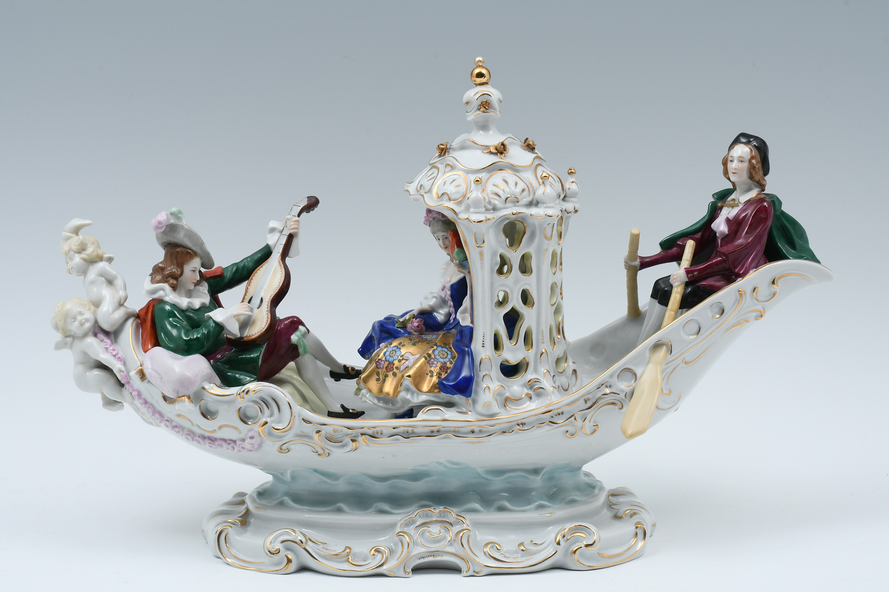 Appraisal: DRESDEN PORCELAIN FIGURAL BOAT SCULPTURE German porcelain sculpture of a