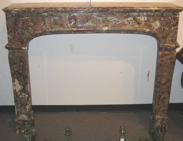 Appraisal: CONTINENTAL MARBLE MANTLE Molded top over the arched opening tapering