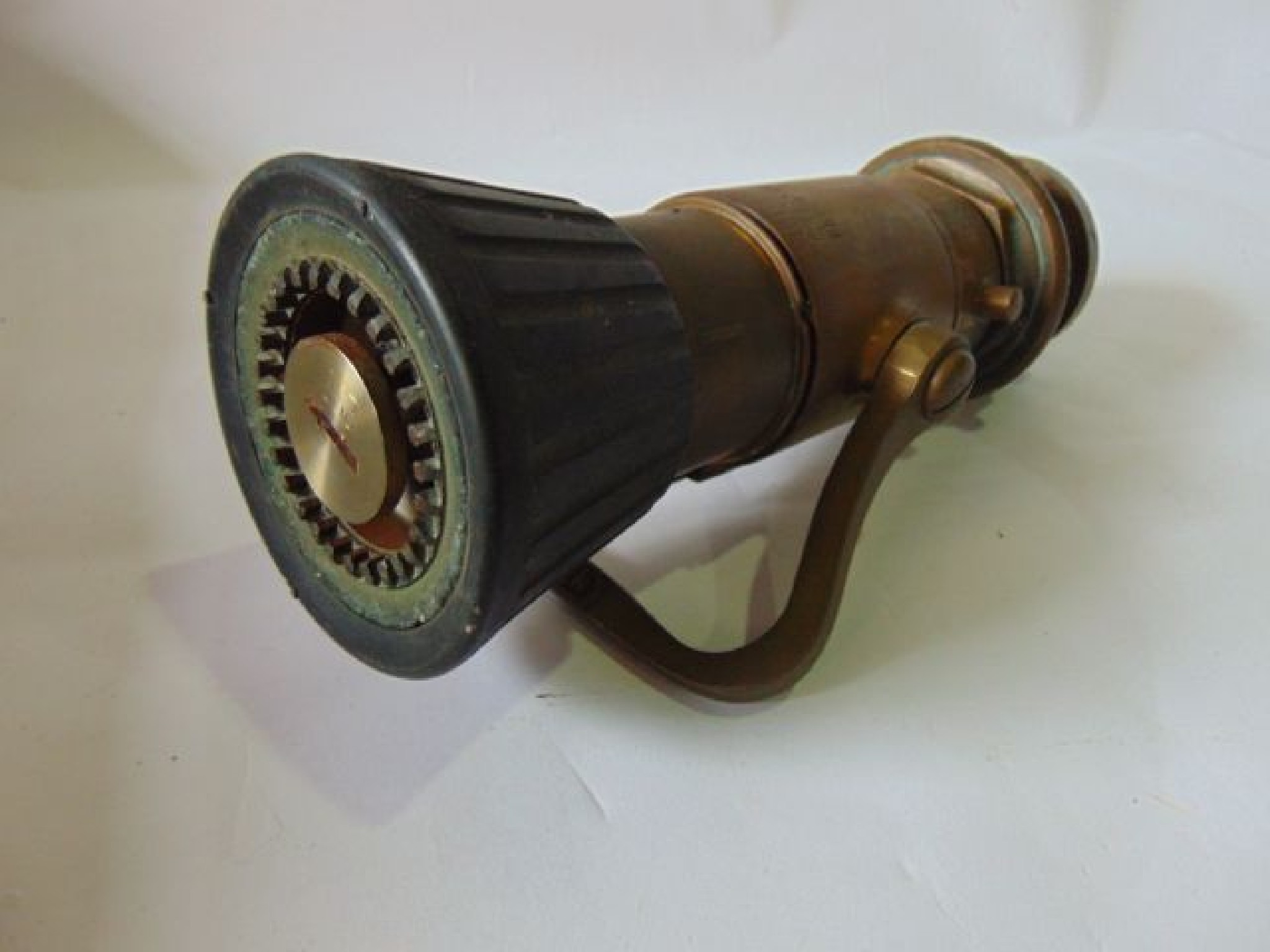 Appraisal: A vintage heavy cast metal fire hose attachment bearing text