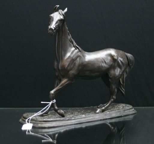 Appraisal: A spelter equestrian sculpture marked 'Emile Loiseau'