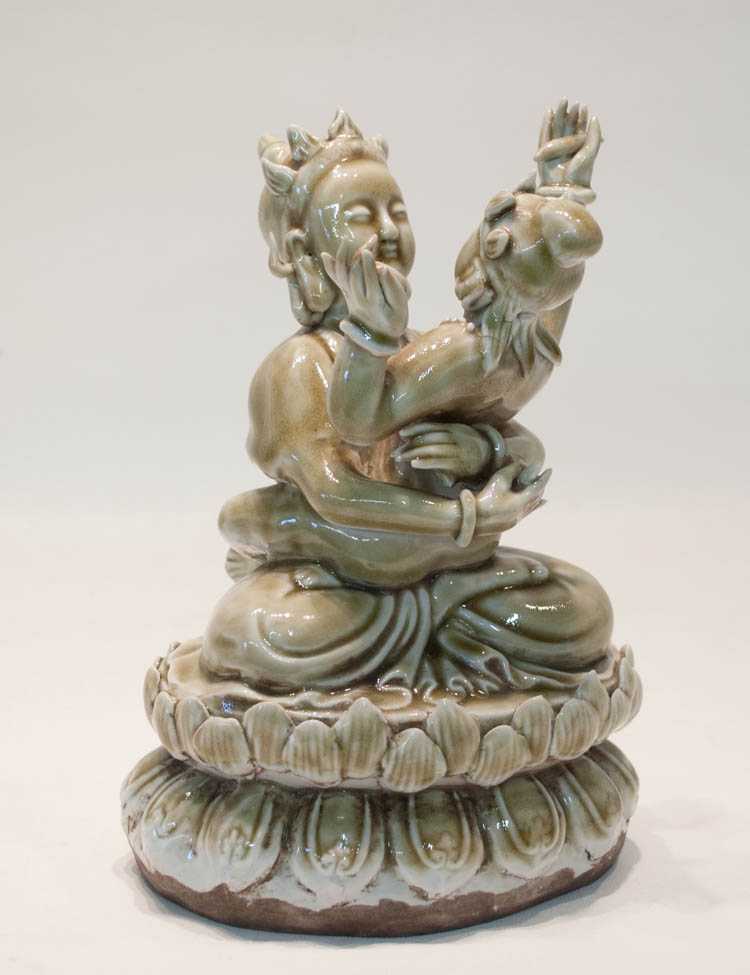 Appraisal: CHINESE QING PORCELAIN FIGURAL SCULPTURE depicting Yab-yum raised on lotus