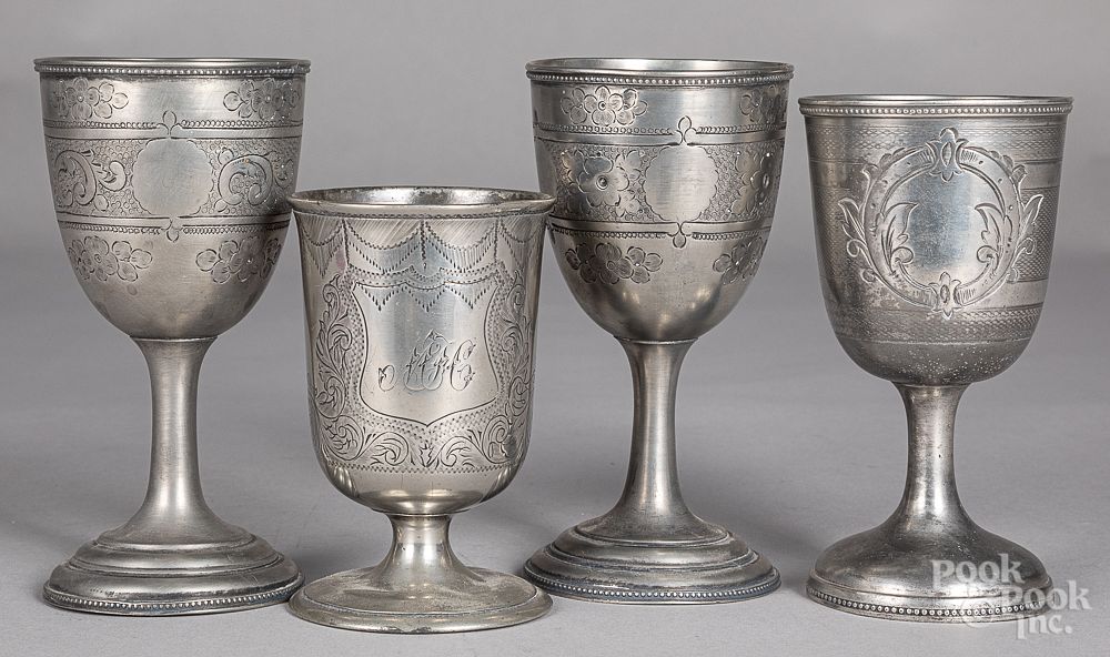 Appraisal: Four engraved pewter chalices Four engraved pewter chalices three by