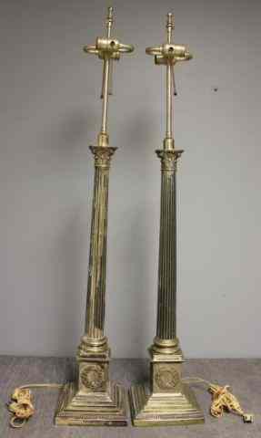 Appraisal: Large Pair of Antique Silverplate Columnar Lamps On stepped plinth